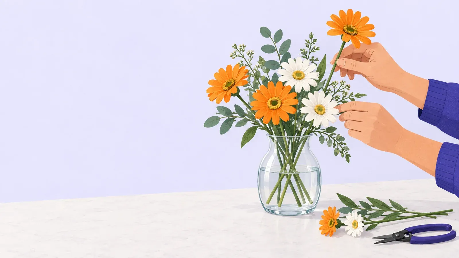 Hands place an orange flower in a glass vase with orange and white blooms and green foliage